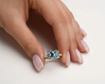 18K Solid Gold 4ct Fancy Blue Natural Diamond Emerald Cut Three Stone Engagement Ring - Alternate Angle | Riyanika Jewels