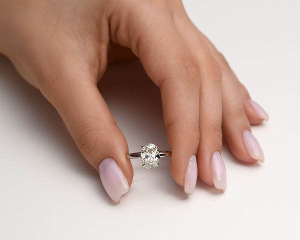 18K Solid Gold 1ct Oval Cut Lab Grown Diamond Classic Solitaire Engagement Ring - Side View | Riyanika Jewels