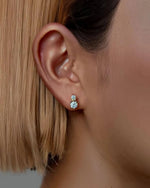 18K Solid Gold Natural Diamond Stud Earrings | Infinity Symbol Double Stone Diamond Stud - Detail | Riyanika Jewels