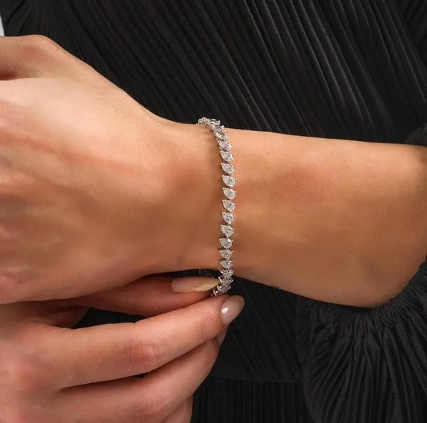18K Solid Gold Lab Grown Diamond 7.5 Carat Pear Cut Infinity Tennis Bracelet - Side View | Riyanika Jewels