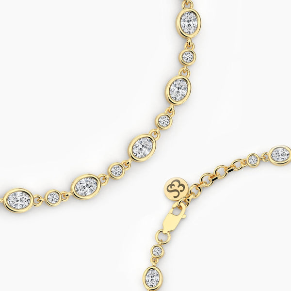 18K Solid Gold Lab Grown Diamond Oval Cut Tennis Bracelet | Delicate Layering Piece for Women - Side View | Riyanika Jewels