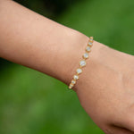18K Solid Gold Natural Diamond Bracelet | 9 Graduated Diamonds Bezel Set - Side View | Riyanika Jewels