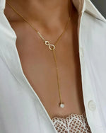 18K Solid Gold Infinity & Solitaire Lab Grown Diamond Pendant With Long Chain Necklace - Side View