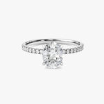 18K Solid Gold 2.00 CT Oval Cut Lab Grown Diamond Hidden Halo Engagement Ring with Sidestones - Side View | Riyanika Jewels