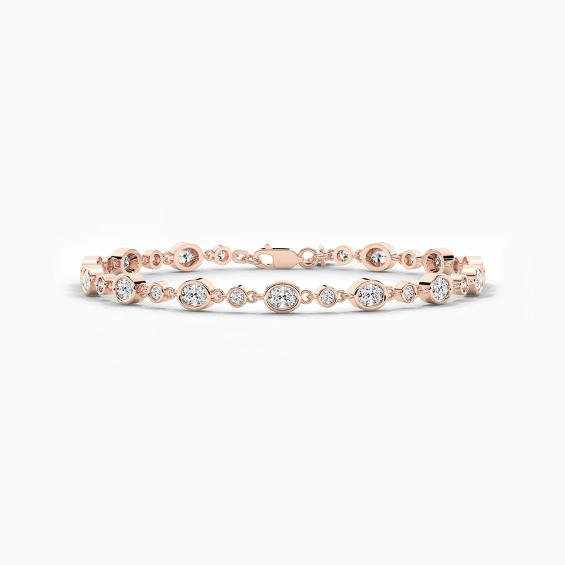 18K Solid Gold Lab Grown Diamond Oval Cut Tennis Bracelet | Delicate Layering Piece for Women - Close Up | Riyanika Jewels